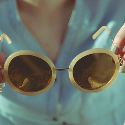 close-up of pearl rounded glasses for women